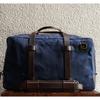 Gambar C.O. Travel Navy Waxed Twill Duffel Bag dari letsdothis Kota Depok 1 Tokopedia