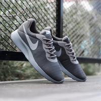 simple black nike trainers