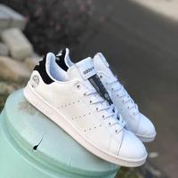 light blue stan smiths