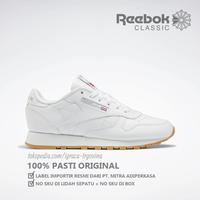 white reebok trainers