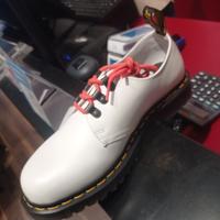 white slip on doc martens