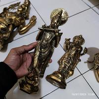 patung dewa krishna gold