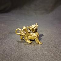 Patung singo nogo pengsui cina besi kuning