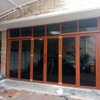 Pintu Lipat serat kayu / motif kayu Aluminium