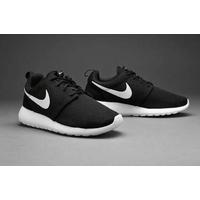 black roshe trainers