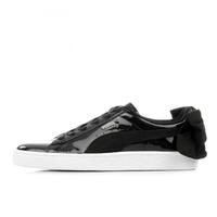 white puma with bow