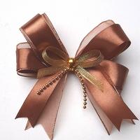 Gambar Pita Jadi Hiasan Kado Coklat Emas - Model 2 dari murakushop undefined 2 Tokopedia