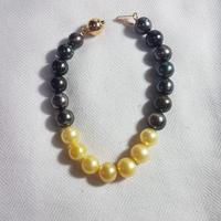 Gambar Gelang mutiara air laut hitam dan gold bracelet lombok pearls keren dari Rachma Pearls undefined 2 Tokopedia