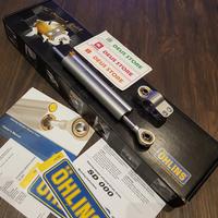 Gambar Steering Damper Universal 63mm Ohlins SD000 dari Deus Store V2 undefined 1 Tokopedia