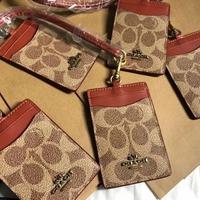 Gambar coach lanyard original id tag dompet kartu tory burch - logo stamp dari brandedspecialist undefined 2 Tokopedia