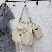 Gambar 2in1 Drawstring Nylon / Tas Slempang 2in1 / Tas+Pouch Wanita Import - Beige dari TravelyciouS undefined 2 Tokopedia