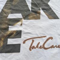 Gambar kaos Drake putih size S dari Wijaya Thriftstore undefined 3 Tokopedia