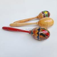 Gambar Alat musik marakas shaker telor 21cm lukis painting mainan anak - Clear polos dari MadeSukawati undefined 1 Tokopedia
