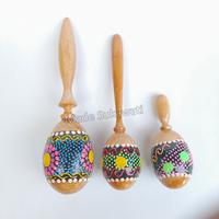 Gambar Alat musik marakas shaker telur stik kayu lukis mainan anak - Lukis, Panjang 12cm dari MadeSukawati undefined 1 Tokopedia