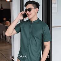 Gambar kemeja distro pria lengan pendek premium kasual polos bahan katun - Cokelat, M dari Zafos.id undefined 1 Tokopedia