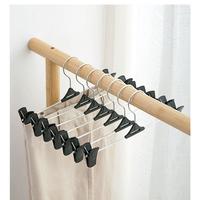 Gambar Hanger Gantungan Jepit Celana Kawat Besi Plastik Rok&Baju Geser 12 Pcs dari displayhanger undefined 3 Tokopedia