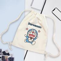 Gambar TAS SERUT MOTIF DORAEMON / DRAWSTRING BAG CANVAS UNISEX - Dora 1 dari grosir maju abadi undefined 1 Tokopedia