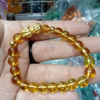 Gambar gelang emas 24 k pixiu piyao batu kristal kuning uk 8 mm dari Lian Lee Buddhistarts undefined 1 Tokopedia