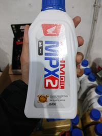 Gambar OLI MESIN MPX2 0.65 SPX2 0,65 650ML ORIGINAL ASLI AHM HONDA GENIO BEAT - MPX2 0.65L dari Sparepartmotorku99 undefined 4 Tokopedia