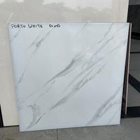 Gambar keramik 50x50 motif carara glossy porto white uno dari SUMBER KERAMIK&GRANIT CIKUDA undefined 1 Tokopedia