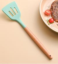 Gambar Spatula Lubang Silikon Utensil Gagang Kayu Tahan Panas Sutil Lubang Silikon Tahan Panas - Hijau Tosca dari Wije.id undefined 4 Tokopedia