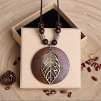 Gambar Kalung Kayu Etnik Kalung Bohemian Tali Panjang Wooden Leaves Necklace - Varian 1 dari Heni Gertimasil undefined 3 Tokopedia