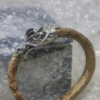 Gambar GELANG AKAR BAHAR PUTIH LORENG KEPALA NAGA BERMAHKOTA KELOR dari ONCE GG undefined 4 Tokopedia