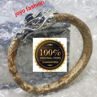 Gambar GELANG AKAR BAHAR PUTIH LORENG KEPALA NAGA BERMAHKOTA KELOR dari ONCE GG undefined 1 Tokopedia