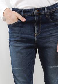 Gambar TRIPLE Celana Jeans Stretch Slim Fit (352 828 01 BWA) - 27 dari TRIPLE Jeans undefined 3 Tokopedia
