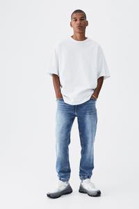 Gambar H&M  Hybrid Regular Tapered Jeans - Denim Blue - M dari DUPLOVE undefined 4 Tokopedia