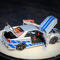 Gambar PGM 64 Nissan Skyline GTR R34 Z-Tune Silver Blue Stripe Fully Opened w/ Engine Display Exclusive Packaging dari MenaraDiecast undefined 4 Tokopedia