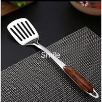 Gambar Sendok Goreng/Sodet/Sutil Stainless Gagang Motif Kayu - Sodet Lobang dari Smile717 undefined 2 Tokopedia