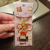 Gambar Gantungan kunci omamori lucky cat festive koi sakura dari Trinkets Linbloom undefined 1 Tokopedia