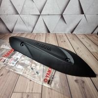 Gambar Cover Tutup Knalpot Tameng Pelindung Yamaha Mio New Sporty Smile 28D dari Onderdil Prima undefined 1 Tokopedia