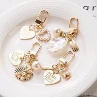 Gambar Bag Charm Phone Compatible For Case Charm Gantungan HP Korean Style Set Gold Metal Pearl Lucu - Telur dari Moriikacase undefined 1 Tokopedia