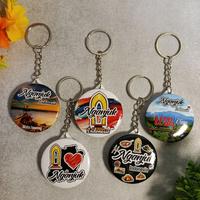 Gambar OLEH-OLEH KHAS KOTA NGANJUK INDONESIA | PROMO GANTUNGAN KUNCI BULAT LINGKARAN | BAHAN PLASTIK GAMBAR 1 SISI UKURAN 44 MM/4,4 CM BELAKANG PUTIH BERSIH | RING STAINLESS KOKOH & KUAT UNTUK TAS PINTU MOTOR MOBIL DLL | DESAIN DICETAK WARNA JELAS | Ganci - No.1( tanpa kemasan) dari ada354merchandise_NEW undefined 1 Tokopedia