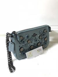 Gambar Coach Nolita Wrislet 19 in Glovetanned Leather with Willow Floral dari Khadeeja Shops undefined 1 Tokopedia