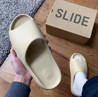 Gambar Sandal Yeezy Slide Bahan Karet, Model Adidas Yeezy Kendal Jenneer - LogoGreen, 39 dari GANDARIA SEPATU undefined 2 Tokopedia