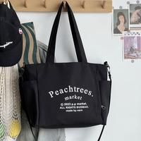 Gambar tote bag kanvas premium sekaligus tas slempang Tote bag resleting lucu - KREM dari overpassion undefined 4 Tokopedia