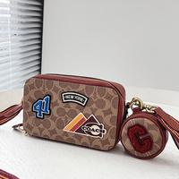 Gambar COÄCH CHARTER SLIM ORIGINAL CROSSBODY IN SIGNATURE CANVAS PATCHES dari Boystore Id undefined 2 Tokopedia