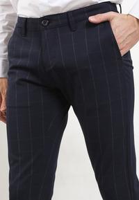 Gambar Celana Formal Pria Slim Fit Andrew Smith A0106X02H - 33 dari AndrewSmith Store undefined 3 Tokopedia