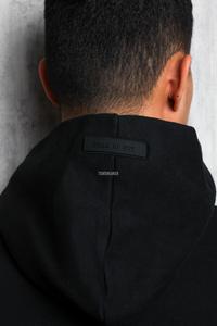 Gambar Fear Of God FOG Essentials Jet Black Hoodie 100% Authentic - XXS dari TSM Sneaker undefined 4 Tokopedia
