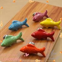 Gambar Ly 2PCS Handle Pintu Bentuk Ikan Lemari Keramik Furniture Hardware dari TF and B undefined 1 Tokopedia