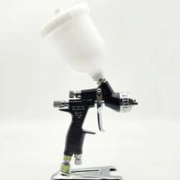 Gambar High Quality Spray Gun GTI Pro Painting Gun 600cc Paint Gun Plastic Cup TE20 1.3/1.8mm Nozzle Air Spray Gun Airbrush dari Rage Effect undefined 4 Tokopedia