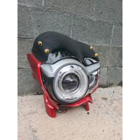 Gambar Ready Stok!! Lampu tiger revo pece set biled projector 3 inch plus daymaker mini 3 mata headlamp tiger pece set biled 3inch set CWL 3 mata lampu tiger pece set cover visor warna Merah dari GORILA PART COSTUME undefined 1 Tokopedia