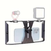Gambar Proshoot Iphone Stabilizer Untuk Smartphone / Iphone Handheld & Tripod Stand For Smooth Videography, Portable Black Vlog Cage dari Boyandgadget by Lintas Negara undefined 3 Tokopedia