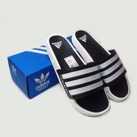 Gambar TERLARIS TERBARU!! - SANDAL SLIDE CASUAL ADIDAS PRIA WANITA SLIP ON PUTIH INSOL HITAM UPPER HITAM LIST PUTIH MURAH!!! MURAH dari racolecshopp undefined 4 Tokopedia