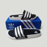 Gambar TERLARIS TERBARU!! - SANDAL SLIDE CASUAL ADIDAS PRIA WANITA SLIP ON PUTIH INSOL HITAM UPPER HITAM LIST PUTIH MURAH!!! MURAH dari racolecshopp undefined 5 Tokopedia