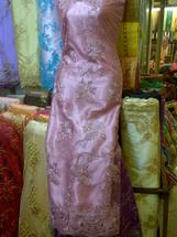 Logo unimen jaya textile