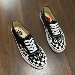 flame checkered slip on vans